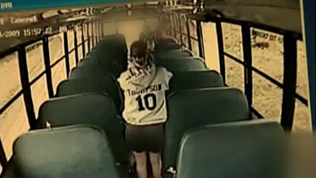 VIDEO: Surveillance cameras show life inside school buses, including this drunk driving incident.