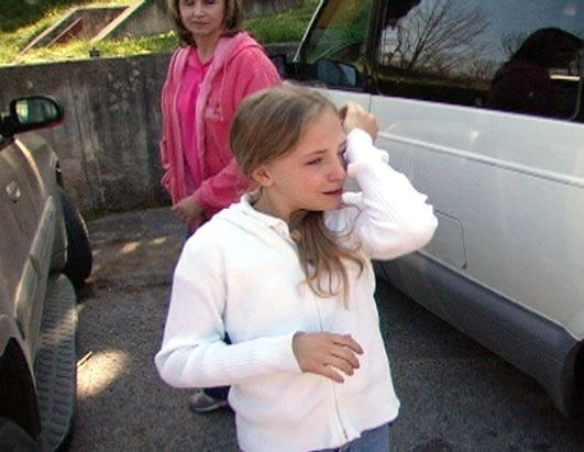 Photo: Erica cries after social services forces her mother, Mona, into rehab.