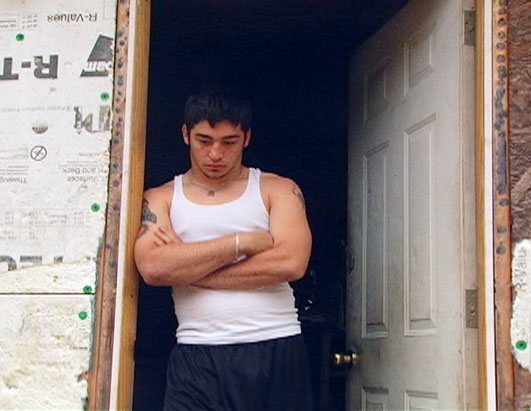 Photo: Shawn in the doorway of his family's trailer in Flat Gap, Ky.