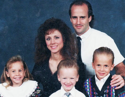 Photo: Douglas and Faylene Grant with their family.