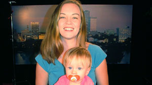 Molly and mommy on TV set