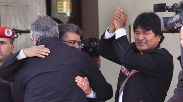 Nicaragua's President Daniel Ortega and his wife stand with Venezuela's Foreign Minister Elias Jaua before the funeral ceremony for Venezuela's late President Hugo Chavez on Friday, March 8, 2013.