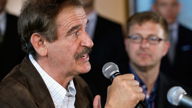 PHOTO: Former Mexican president Vicente Fox, left, speaks as Jamen Shively, CEO of Diego Pellicer, looks on during a news conference Thursday, May 30, 2013, in Seattle. 