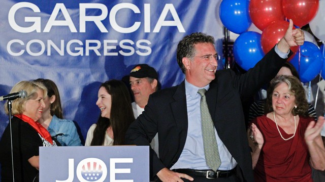 PHOTO: Democrat Joe Garcia celebrates his victory over Republican Congressman David Rivera