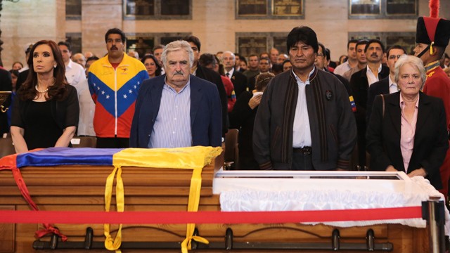 PHOTO: Leftist allies of President Hugo Chavez stand by his coffin in this photo taken in Caracas on March 6, 2013.