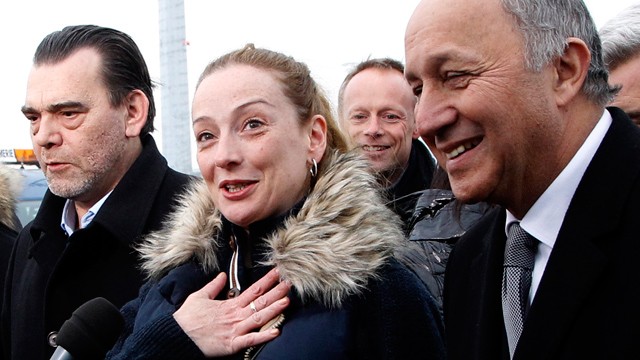 PHOTO: Frenchwoman Florence Cassez smiles after landing at Roissy airport, north of Paris, Thursday, Jan.24, 2013. Cassez, who spent seven years in prison in Mexico on kidnapping charges returned to a hero's welcome in Paris on Thursday.
