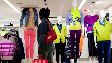 PHOTO: A customer passes merchandise at a J.C. Penney store in New York. J.C. Penney