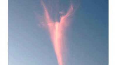PHOTO: A cloud shaped as an angel was seen in Miami, Florida, after the new Pope was announced.