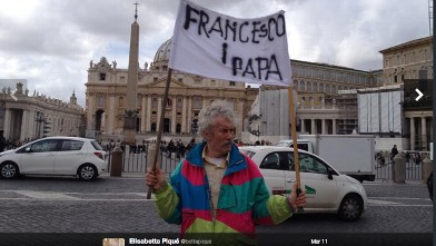 PHOTO: A man holds a sign in the Vatican on March 11th. Two days later the name of the new Pope was revealed and this man was right!