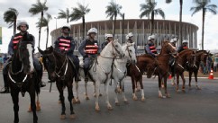 PHOTO: Security officers guard the National Stadium in Brasilia, on June 15, 2013.  Large spending on world cup stadiums like this one, has sparked numerous protests in Brazil. (Dean Mouhtaropoulos/Getty Images)
