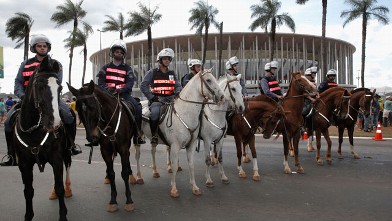 PHOTO: Security officers guard the National Stadium in Brasilia, on June 15, 2013.  Large spending on world cup stadiums like this one, has sparked numerous protests in Brazil. (Dean Mouhtaropoulos/Getty Images)