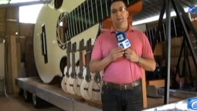 PHOTO: Luis Colon Ortiz, built a 30 foot long version of Puerto Rico's iconic instrument, the Cuatro.  It could be the world's largest acoustic instrument.