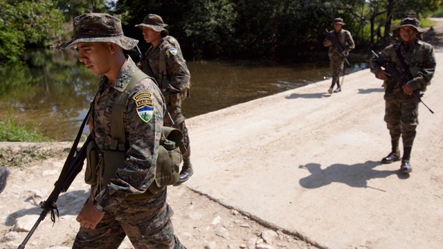 PHOTO: Soldiers patrol in San Valentin in Guatemala´s remote El Peten region,  near the border with Mexico.