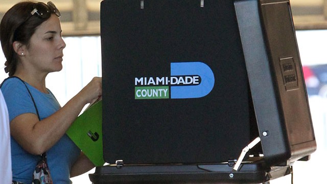 PHOTO: A woman casts her vote at Hialeah Fire Station #5 in Hialeah, Fla. on Election Day Tuesday, Nov. 6, 2012.