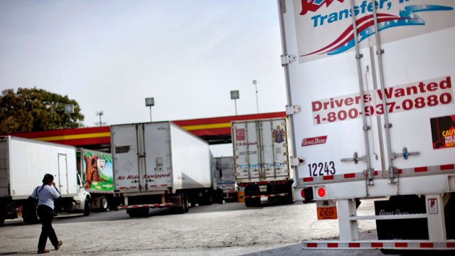 PHOTO: A sign on the back of a truck advertises job openings at a truck stop Tuesday, Oct. 30, 2012, in Atlanta. Even amid a struggling economy with high unemployment, trucking companies had a tough time hiring young drivers willing to hit the road for lo
