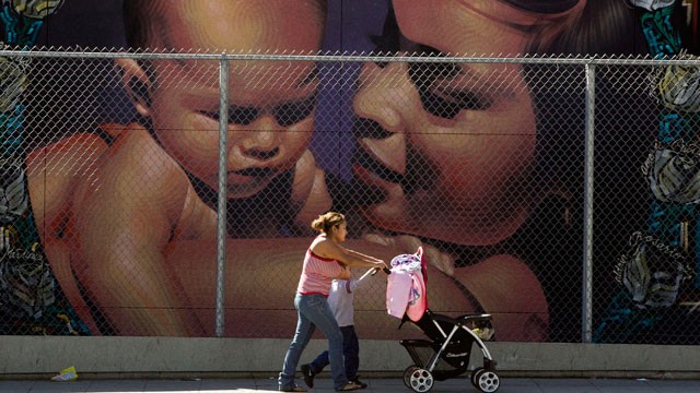 PHOTO:&nbsp;A mother walks with her children to the MacArthur Park Primary Center School in Los Angeles Thursday, Jan. 31, 2013. Within six months, California's Hispanic population will equal that of whites.