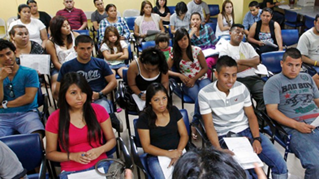PHOTO: In this Thursday, Sept. 20, 2012 photo , Charlene Gomez leads an orientation seminar for undocumented immigrants.