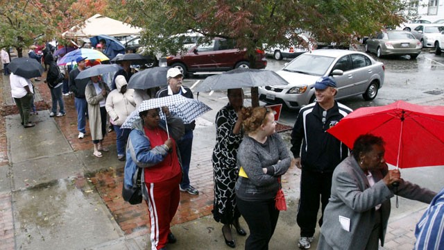 PHOTO: Voters wait in line despite rains from Hurricane Sandy to vote on the last early voting Sunday before election day, in New Bern, N.C., on Oct. 28, 2012. Early voting ends in Craven County on November 3.