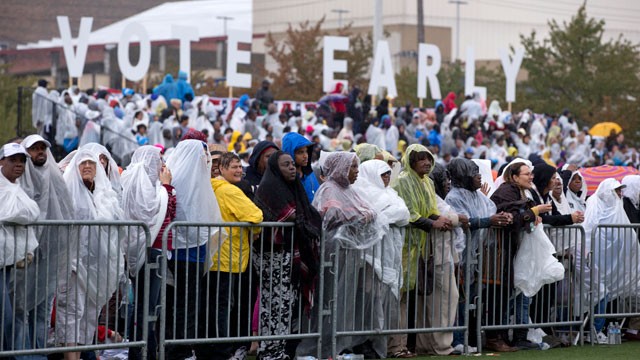 PHOTO: FILE - In this Oct. 5, 2012 file photo, people wait in the rain for President Barack Obama to speak at a campaign event at Cleveland State University in Cleveland.