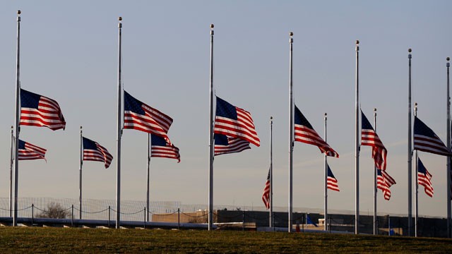 PHOTO: American flags surrounding the Washington Monument in Washington are lowered to half-staff in a mark of respect for the victims on the Connecticut elementary school shootings