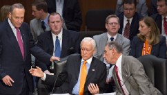 PHOTO: From left, Sen. Chuck Schumer, D-N.Y., standing, Sen. Orrin G. Hatch, R-Utah, and Sen. Chuck Grassley, R-Iowa, confer as the Senate Judiciary Committee meets on immigration reform on Capitol Hill in Washington, Thursday, May 9, 2013.