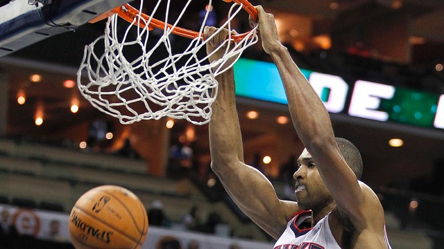 PHOTO: Atlanta Hawks' Al Horford (15) dunks during the second half of an NBA basketball game in Charlotte, N.C., Friday, Nov. 23, 2012. The Hawks won 101-91.