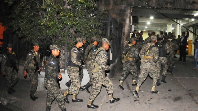 PHOTO:Â Honduras army soldiers secure the area outside of the National Congress in the capital city of Tegucigalpa, Honduras, Tuesday Dec. 11, 2012.