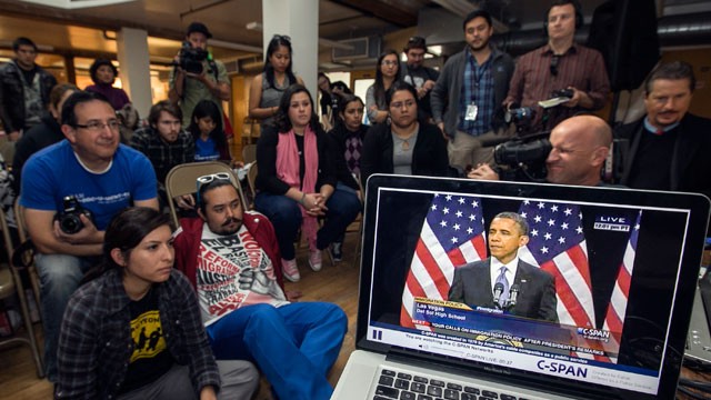 PHOTO: Members of the DREAM Team LA watch President Obama speak about immigration in Los Angeles, Tuesday, Jan. 29, 2013.