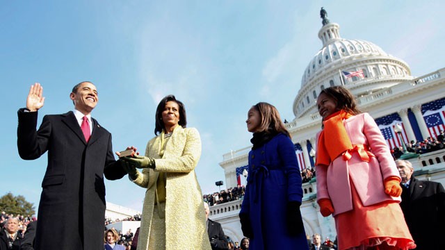 PHOTO: This Jan. 20, 2009 file photo shows Barack Obama, left, taking the oath of office from Chief Justice John Roberts, not seen, as his wife Michelle, holds the Lincoln Bible and daughters Sasha, right and Malia, look on at the Capitol in Washington.