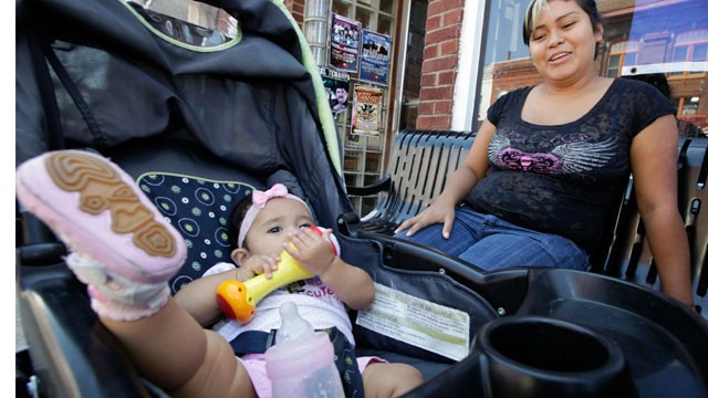 PHOTO: Erika Reyes sits with her seven-month-old daughter