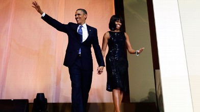 PHOTO: President Barack Obama and first lady Michelle Obama arrive to speak to supporters and donors at an inaugural reception for the 57th Presidential Inauguration at The National Building Museum in Washington, Sunday, Jan. 20, 2013.