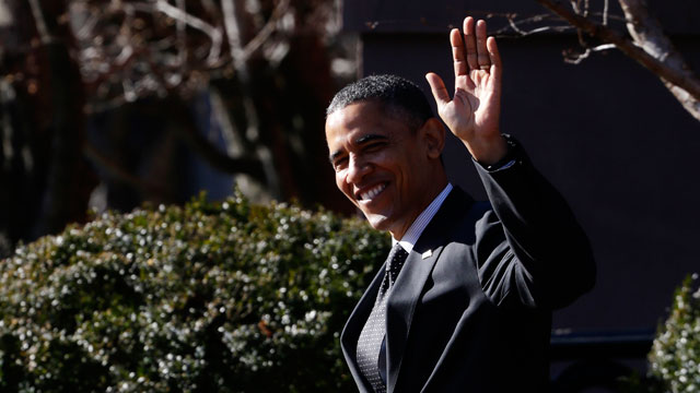 PHOTO: President Barack Obama waves to reporters as they shout questions to him regarding the fiscal cliff as he walks across Pennsylvania Avenue back to the White House in Washington, Thursday, Dec. 13, 2012
