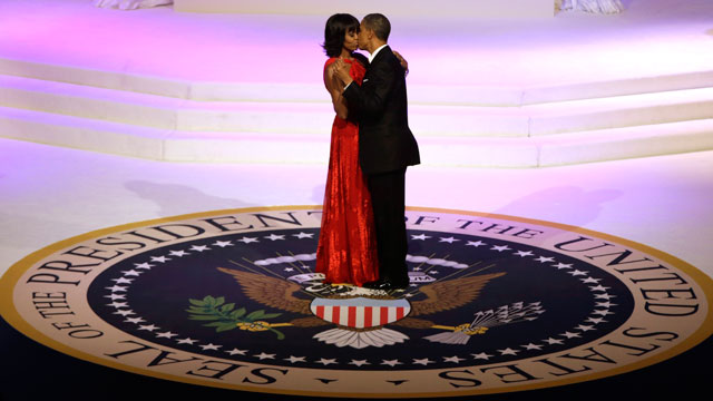 PHOTO: President Barack Obama and first lady Michelle Obama kiss as they dance during the Commander-In-Chief inaugural ball at the Washington Convention Center during the 57th Presidential Inauguration on Monday, Jan. 21, 2013 in Washington.