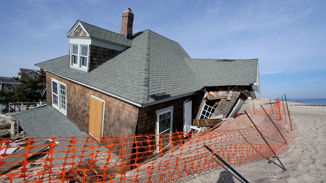PHOTO: A beach front home that was severely damaged two months ago by Superstorm Sandy rests in the sand in Bay Head, N.J., Thursday, Jan. 3, 2013.