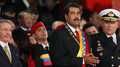 PHOTO:  Venezuela's newly sworn-in President Nicolas Maduro, second from right, attends a military parade.