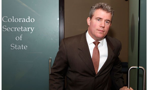 Colorado Secretary of State Scott Gessler leaving his office in Denver