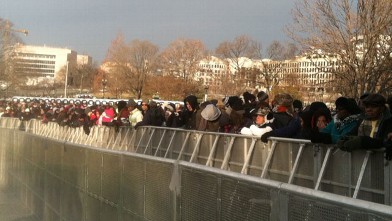 PHOTO: People wait near the Capitol in Washington, D.C. for the inauguration ceremonies to begin on Monday, Jan. 21, 2013.