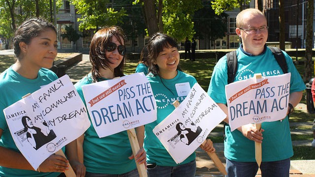 PHOTO:&nbsp;Young people hold signs in support of the DREAM Act.