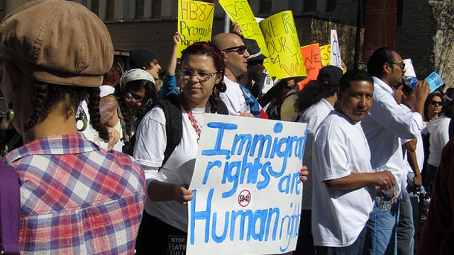 PHOTO: Immigration activists protest Georgia's immigration law at a rally in 2011.