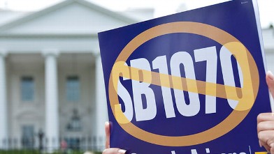 PHOTO: An SB1070 protest sign