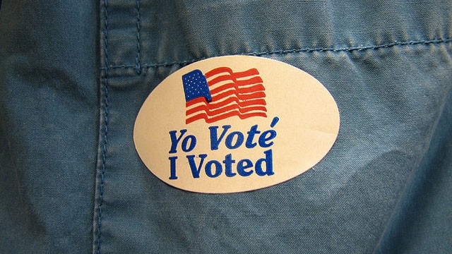 PHOTO: An ?I voted? sticker is displayed on a shirt pocket.