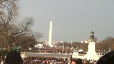 PHOTO: Crowds of people fill the Mall, all the way to the Washington Monument.