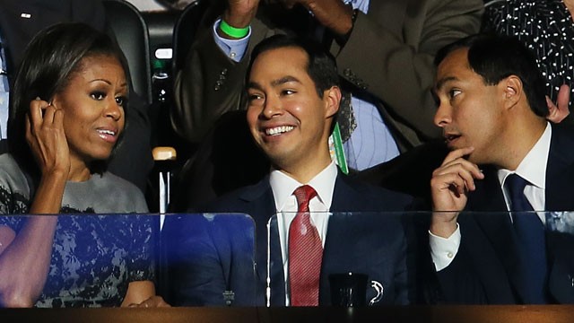 PHOTO: First Lady Michelle Obama talks with San Antonio Mayor Julián Castro (C) and his brother Joaquín Castro during day two of the Democratic National Convention on September 5, 2012.
