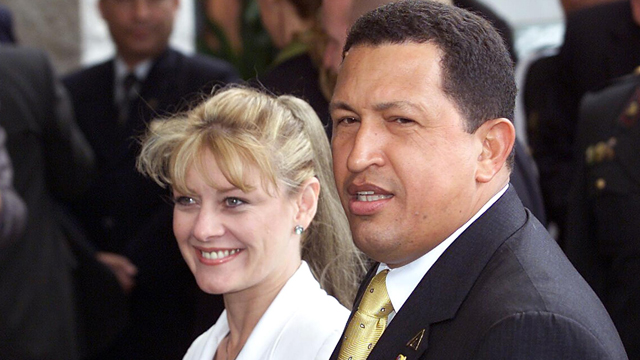 PHOTO: Hugo Chavez, the president for Venezuela, is accompanied by his then-wife Marisabel Rodriguez de Chavez, in the hotel where the inauguration XI Iberoamericana is, 23 November 2001, in Lima.