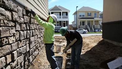 PHOTO: Mexican immigrants work on a housing development on May 3, 2013 in Denver, Colorado. The resurgent housing market has helped drive down unemployment for American workers but also for undocumented immigrants, many of whom work in construction.