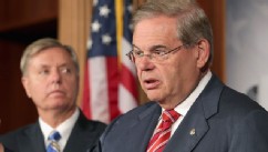 PHOTO: U.S. Senate Foreign Relations Committee Chairman Robert Menendez (D-N.J.) (R) and U.S. Sen. Lindsey Graham (R-S.C.) hold a news conference on May 22, 2013 in Washington, D.C.