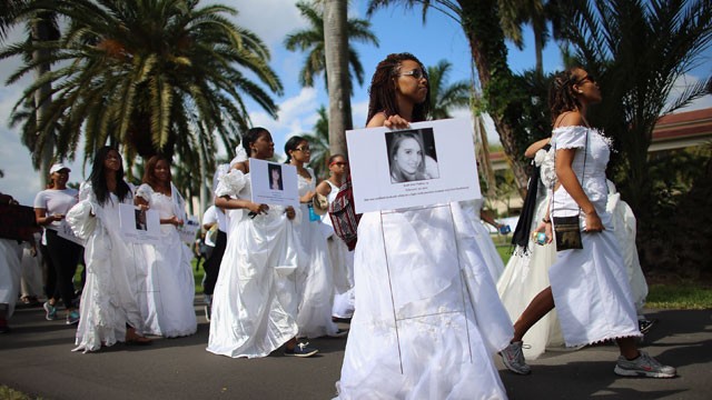 PHOTO: College students wear wedding gowns as they participate in the College Bride's Walk from Barry University on February 8, 2013 in Miami Shores, Florida. The students walked six miles to raise awareness of the issue of domestic violence.