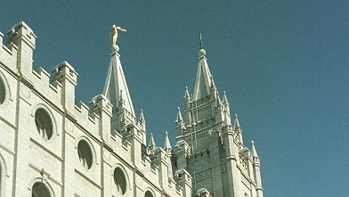 PHOTO: Morman Missionary Stacey Bernal conducts a tour at the Mormon Temple