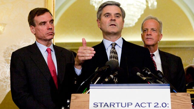 PHOTO: Steve Case, a member of President Obama's Council on Jobs and Competitiveness, speaks as Senators Jerry Moran (R-KS) and Mark Warner (D-VA) look on, at the Capitol in Washington, D.C., on Tuesday, May 22, 2012.