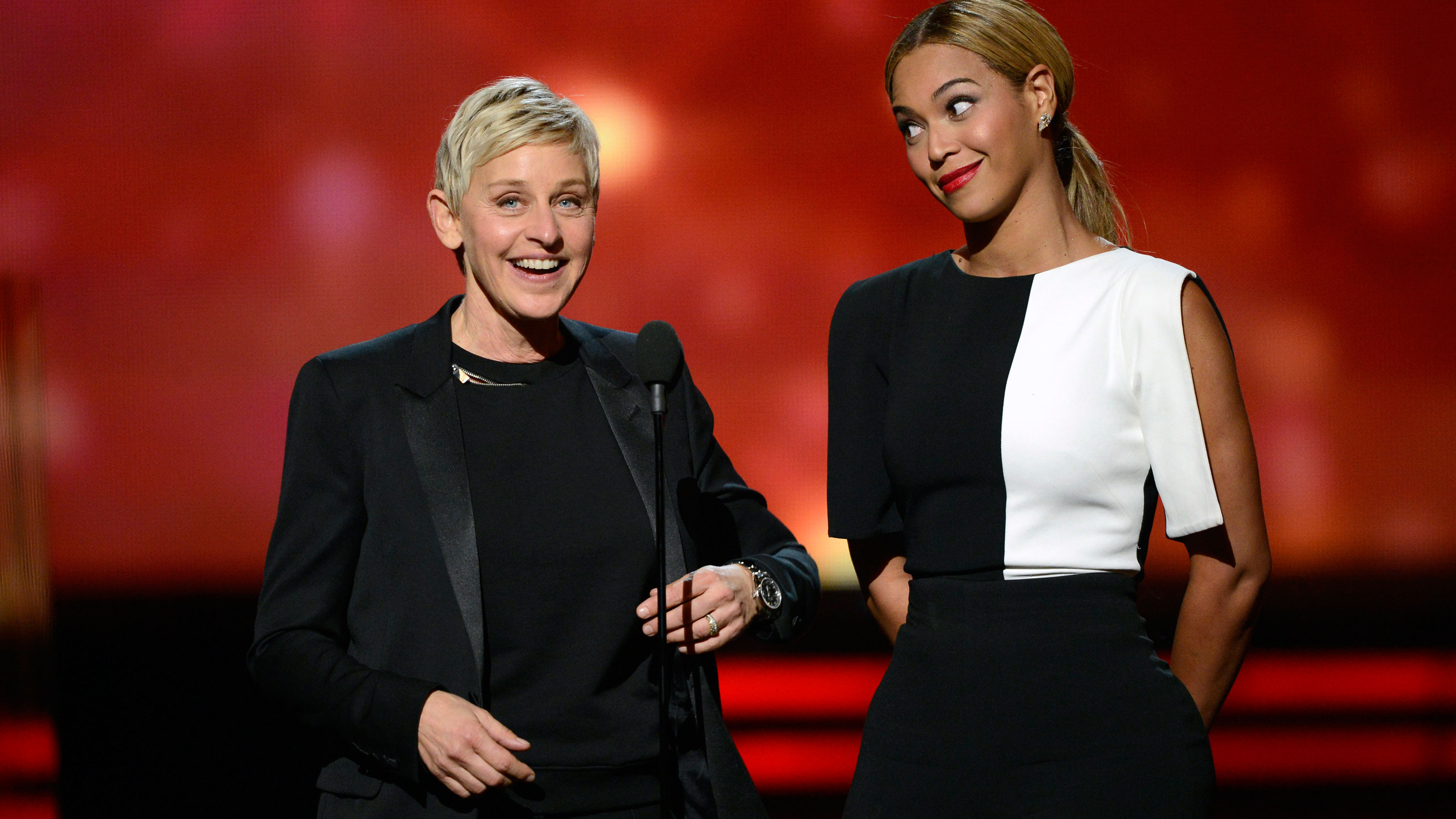 PHOTO: Ellen DeGeneres dons a monochromatic looks for presenting alongside Beyonce.